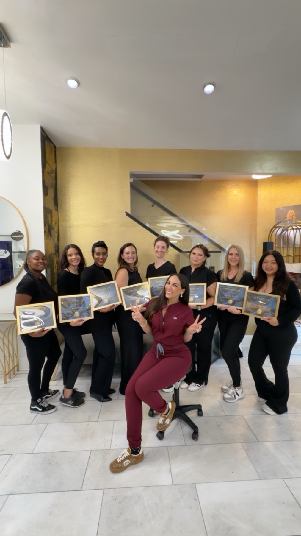 Heather Franks with fellow paramedical tattoo artists at a training completion